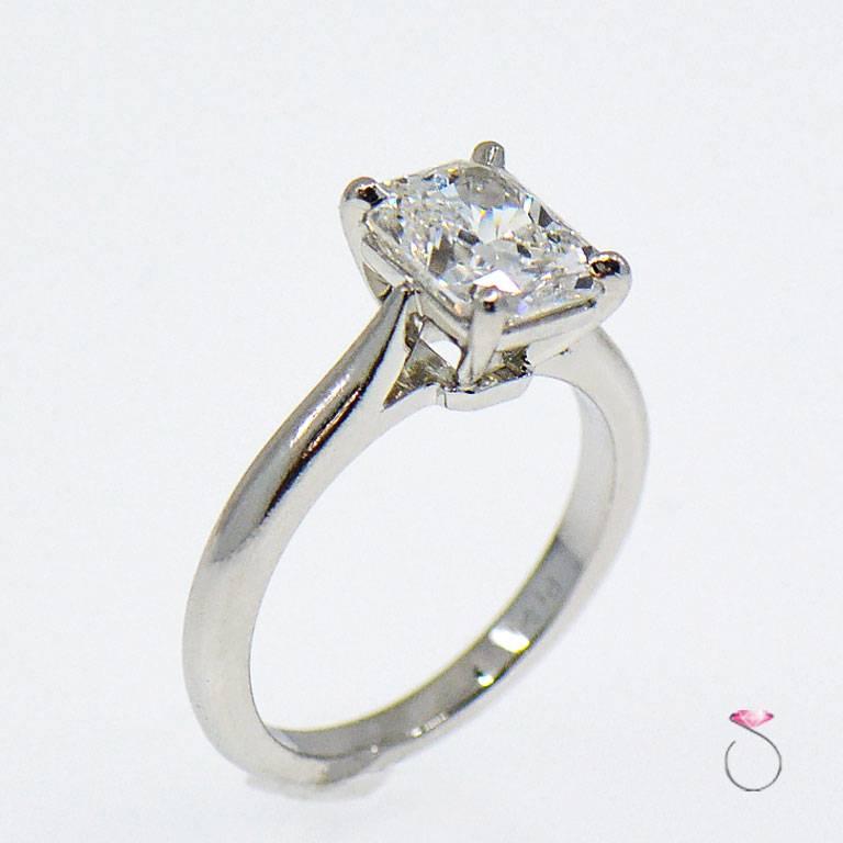 This solitaire has been a Cartier classic since 1895. The elegance of the lines is unique, the refined and gentle setting allows the light of the diamond to flow freely.
This Authentic Cartier Platinum Solitaire engagement ring features a 1.34 ct.