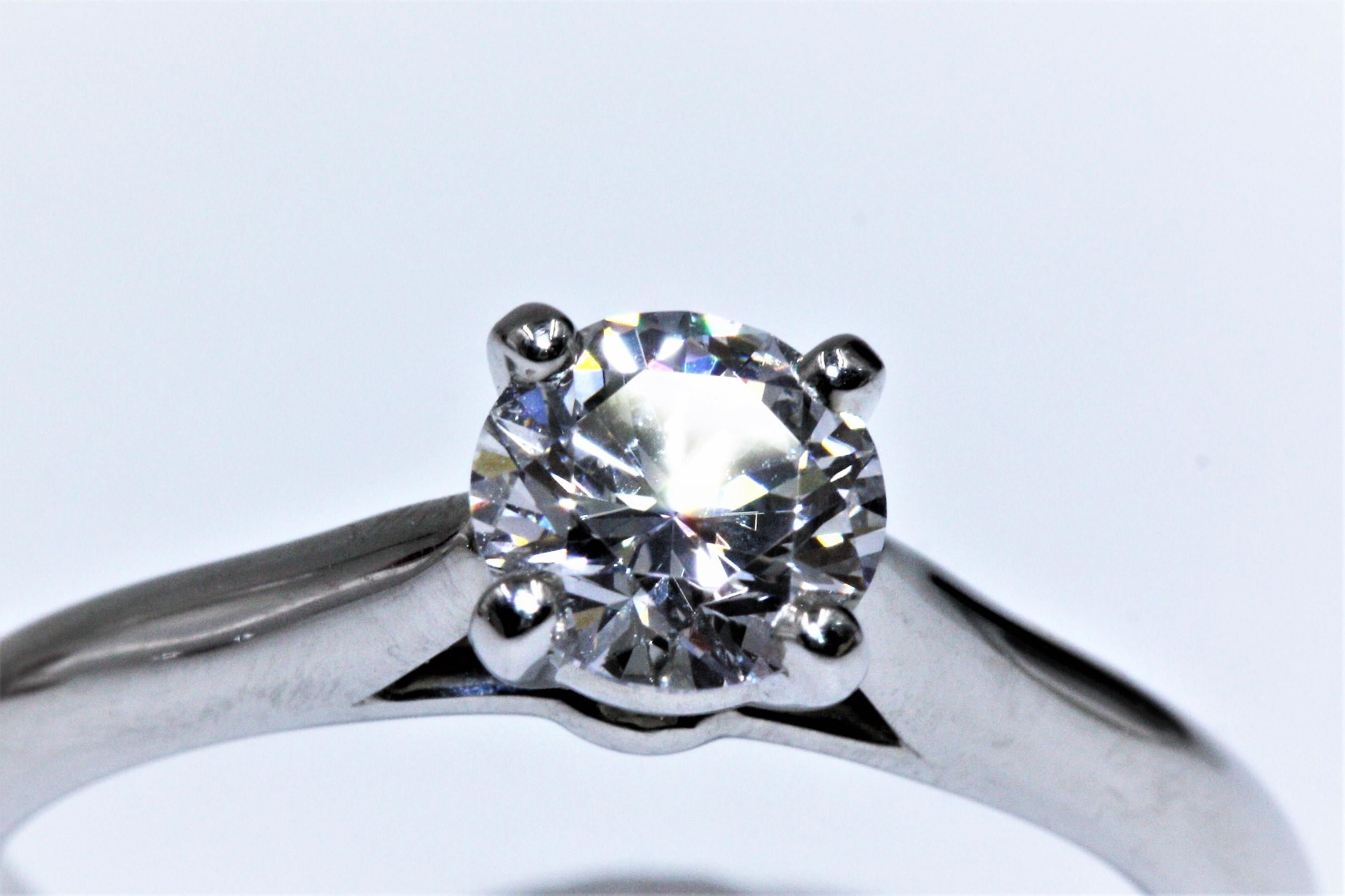 Cartier 1895 Solitaire Platinum Diamond Ring, 0.7 Carat VVS1 E For Sale 6