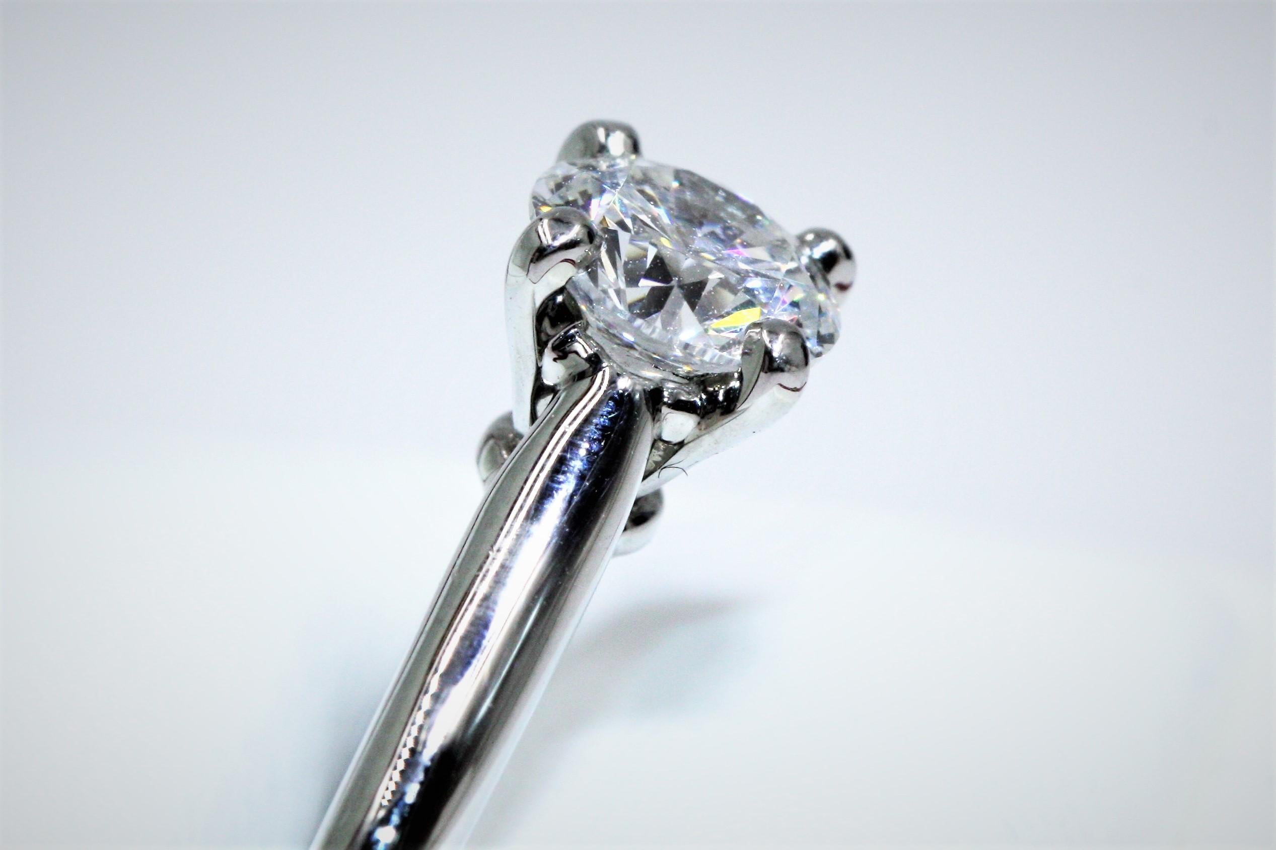 Women's Cartier 1895 Solitaire Platinum Diamond Ring, 0.7 Carat VVS1 E For Sale
