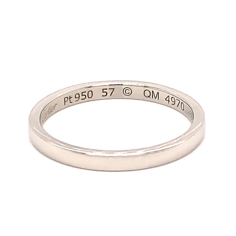 Authentic Cartier 1895 wedding band. This band is beautifully crafted in platinum 950 with a high polish finish. The band is 2.1 mm wide and 1.5 mm thick.  The band is hallmarked 