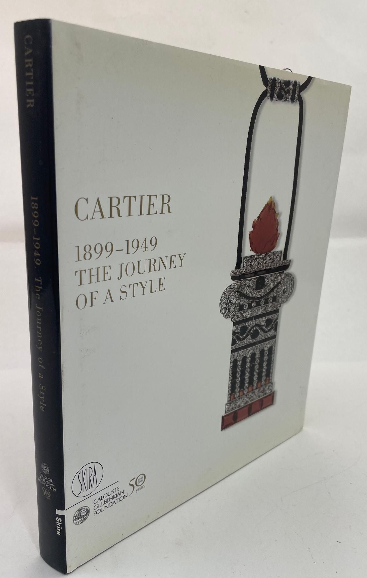 Cartier: 1899-1949, the Journey of a Style Hardcover Book by Thierry Coudert.
João CASTEL-BRANCO PEREIRA, Thierry COUDERT, Bernard FORNAS, Maria Fernanda PASSOS LEITE, Pierre RAINERO, Côme REMY, Judy RUDOE, Nuno VASSALO E SILVA, Emilio Rui