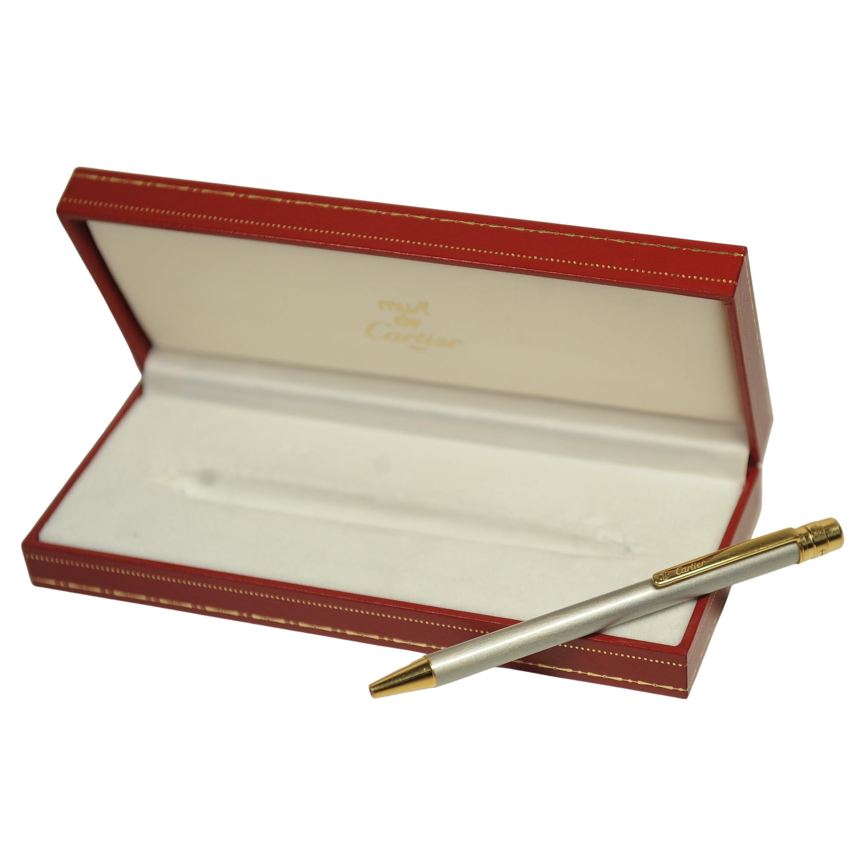 Francese Penna a sfera Cartier Santos placcata oro 18ct e acciaio spazzolato in scatola originale in vendita