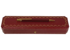 Bolígrafo Cartier chapado en oro de 18 ct y lacado en rojo con estuche Cartier rojo