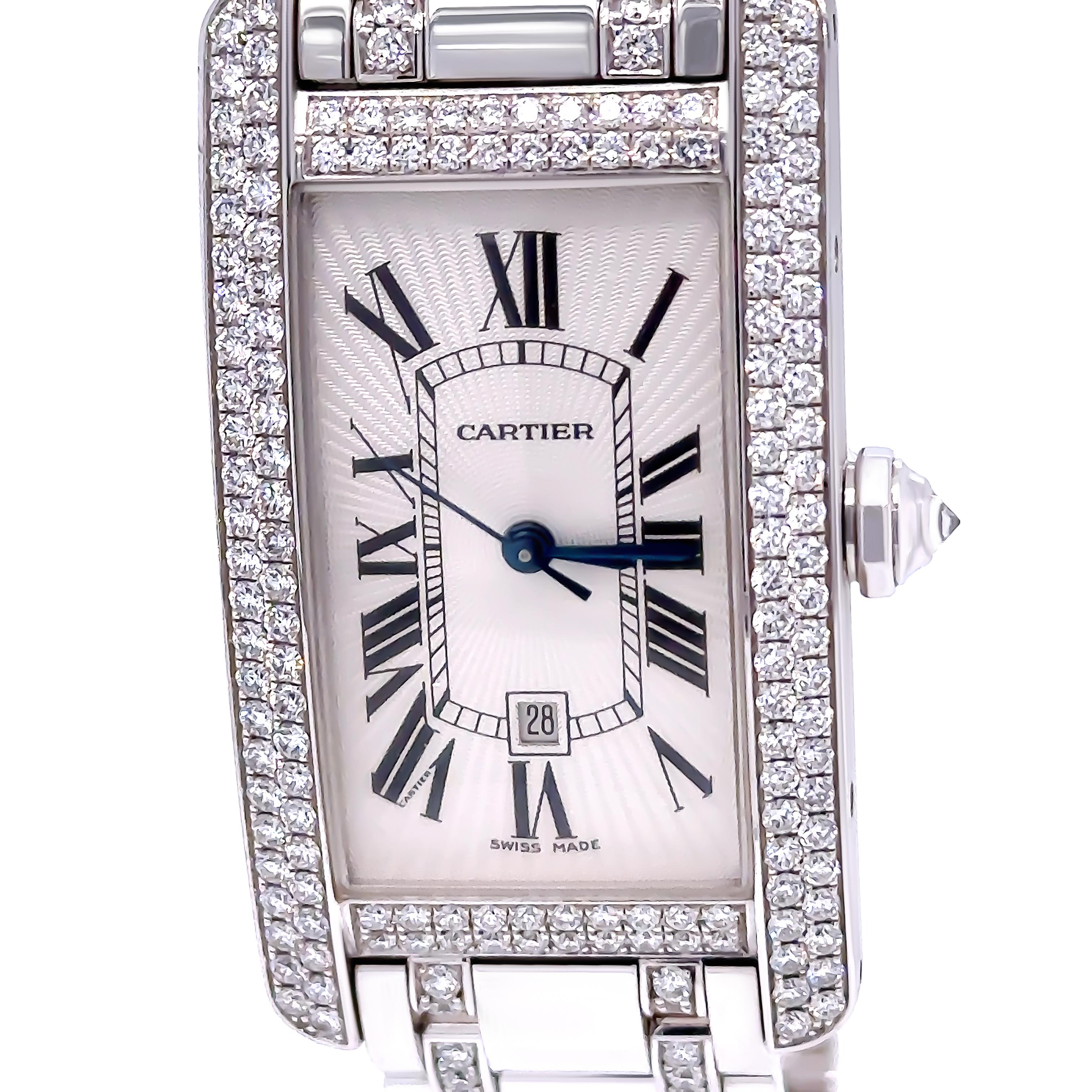 A Cartier Tank Américaine Diamond Watch, made of 18ct White Gold. Reference Number 2490. Automatic movement Sapphire crystal with a silver roman dial.

The Crown is set with a Round Brilliant Cut Diamond, G Colour, VS Clarity, weighing 0.07ct. The