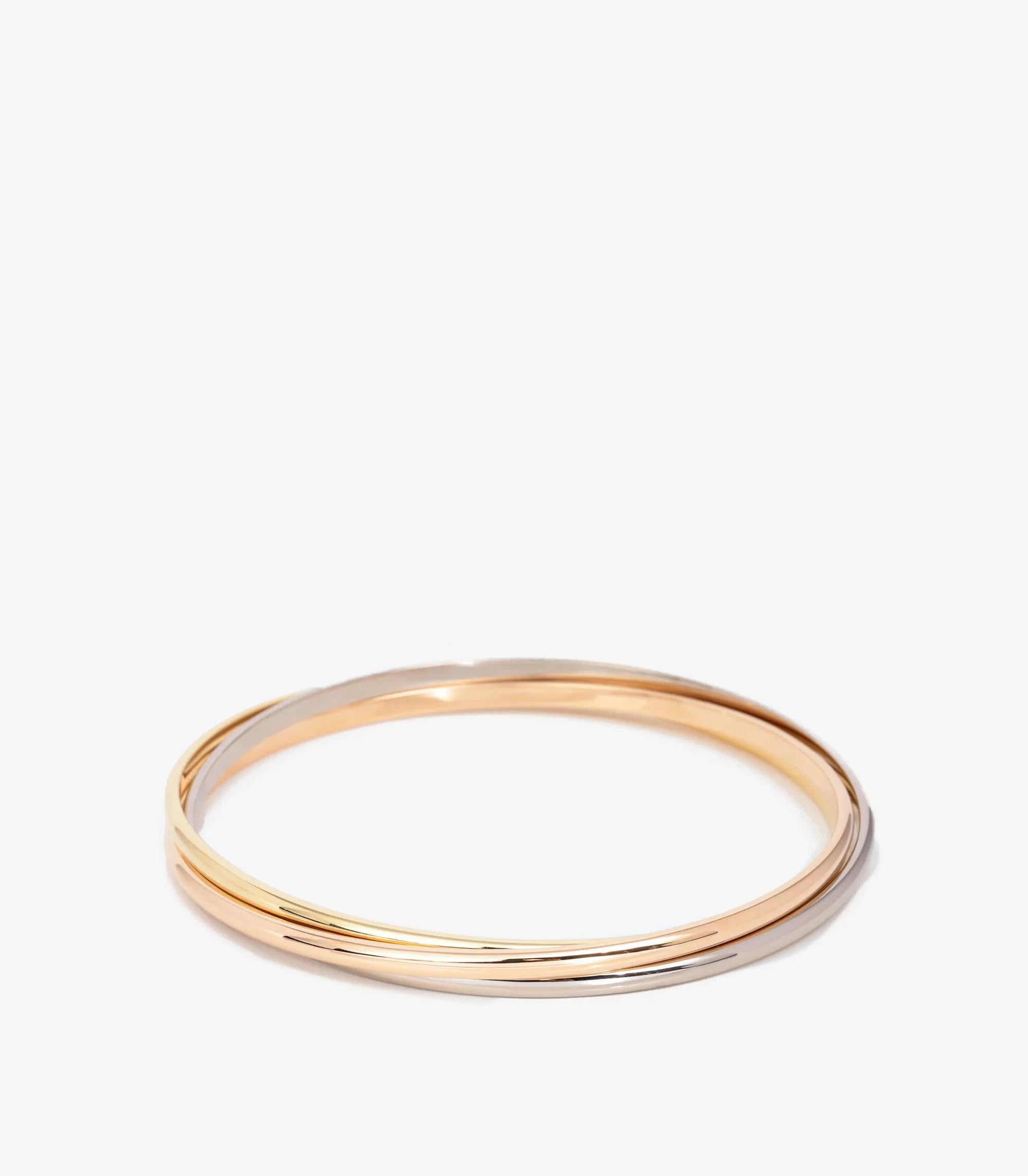 Cartier 18ct White Gold, 18ct Yellow Gold And 18ct Rose Gold Small Trinity Bangle

Brand- Cartier
Model- Small Trinity Bangle
Product Type- Bracelet
Serial Number- ET****
Age- Circa 2018
Accompanied By- Cartier Certificate
Material(s)- 18ct White