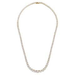 Cartier, collier ligne Tennis en or jaune 18 carats et diamants ronds et brillants