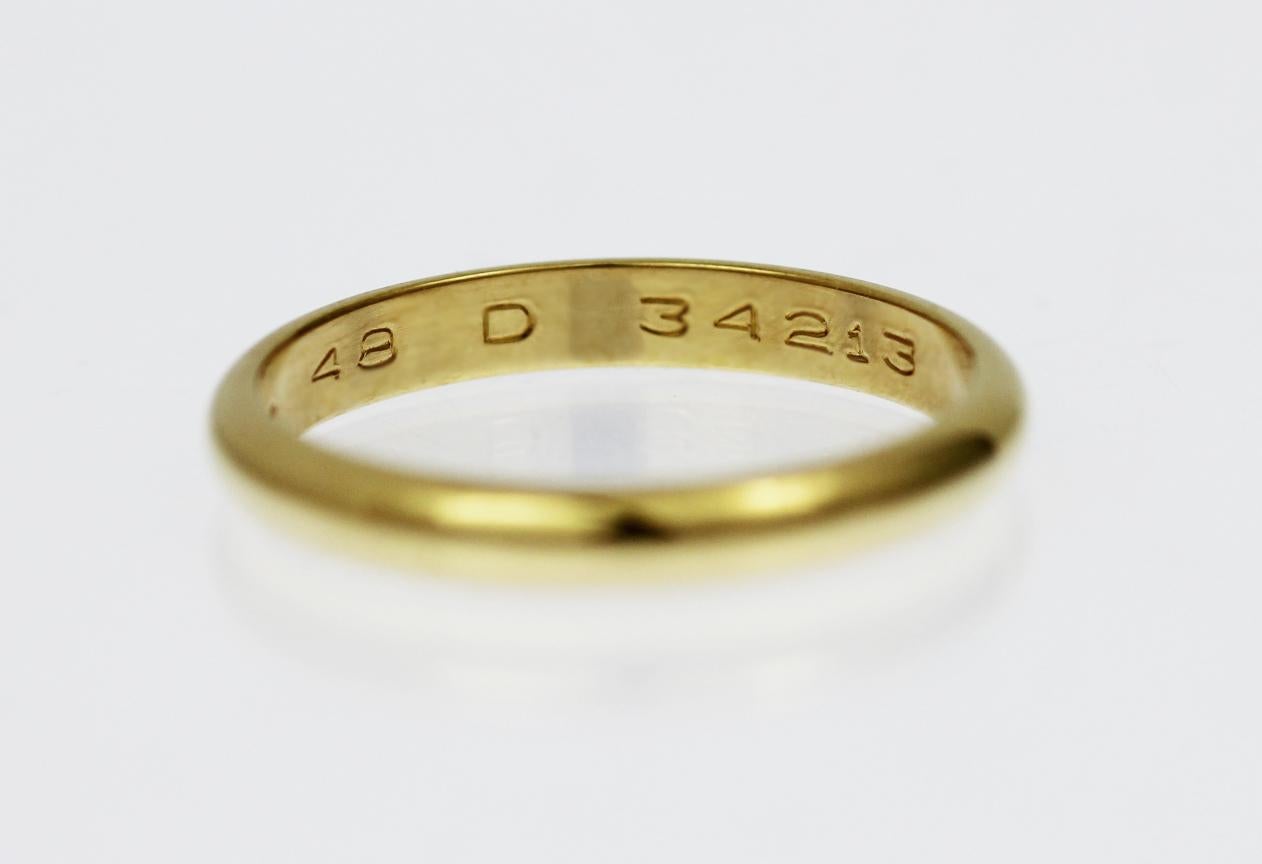 18ct yellow gold polished wedding band for ladies by Cartier

Stamped inside '750 Cartier 48 D 34213'

Finger size: 48 or UK 'I'

Band width: 2.5mm

Weight: 2.1g