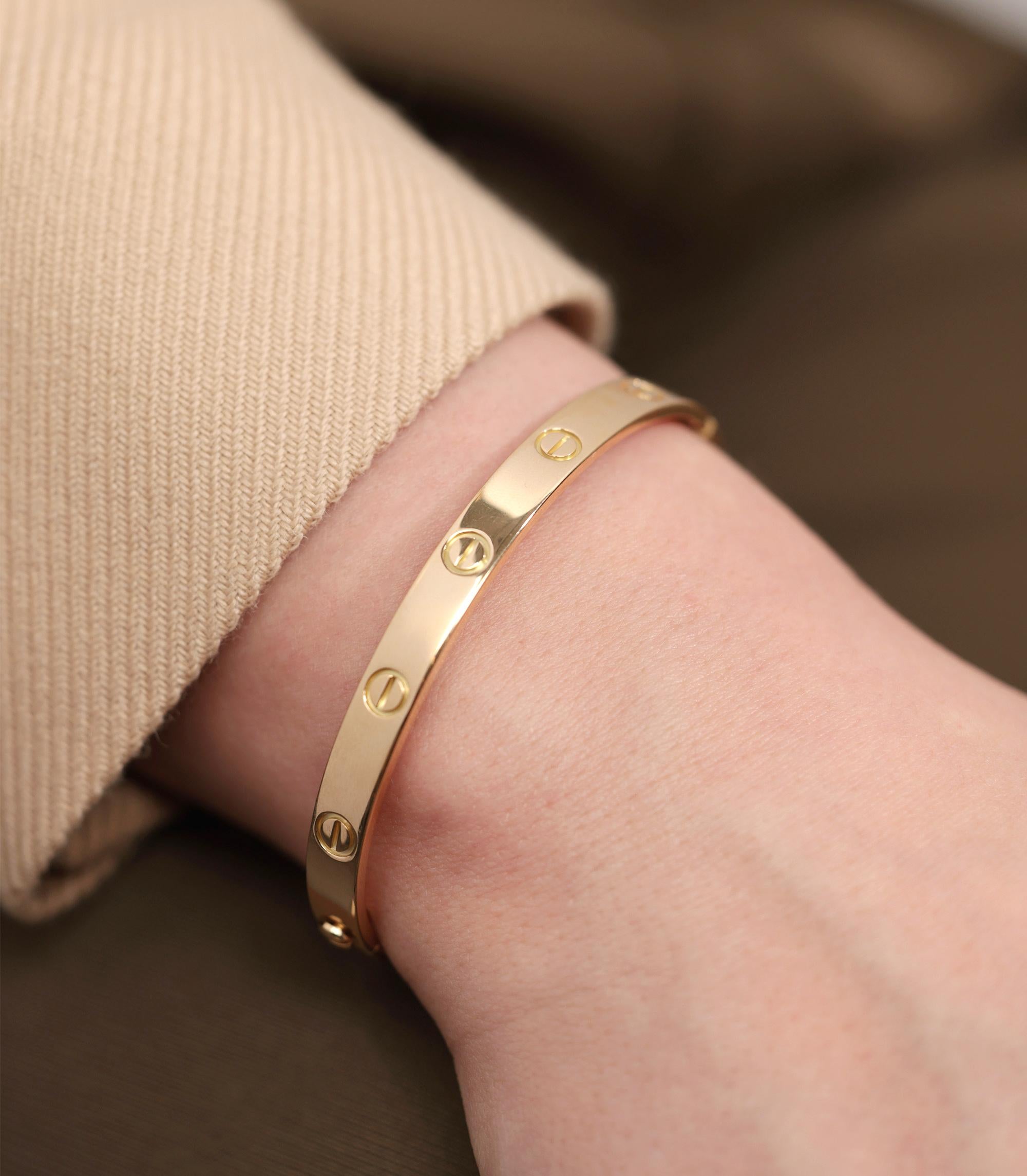 Cartier 18ct Yellow Gold Love Bangle

Product Details
Xupes Ref: J1378
Brand: Cartier
Model: Love Bangle
Type: Bracelet
Serial Number: B*****
Age: 2015
RRP: £7,050
Accompanied By: Cartier Pouch, Certificate, Screwdriver 
Material(s): 18ct Yellow