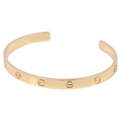 Cartier Bracelet manchette Love en or jaune 18 carats