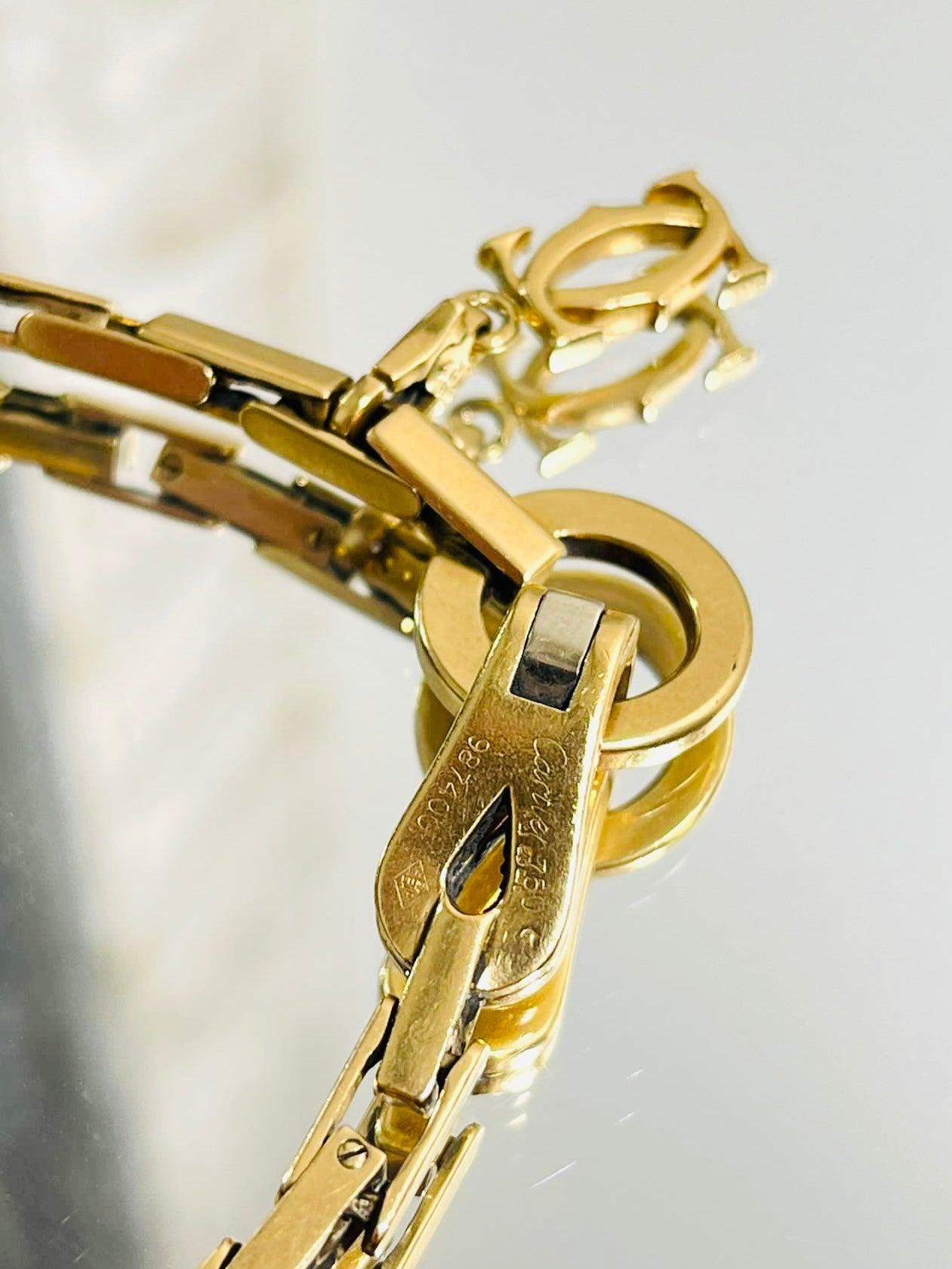 Cartier 18k Gold Agrafe Bracelet & Logo Charm For Sale 3