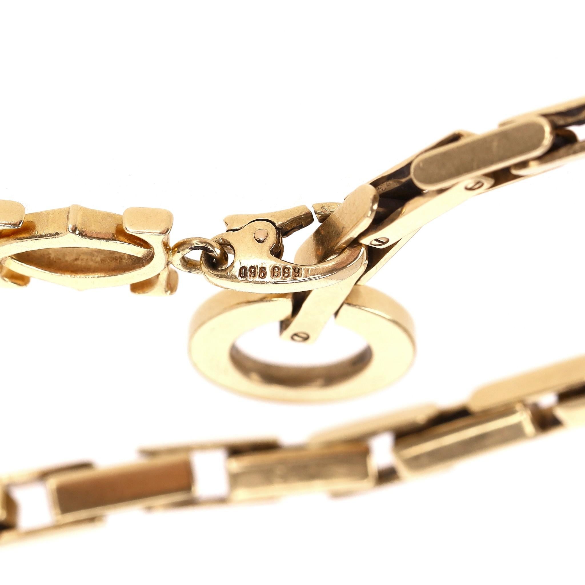 Cartier 18k Gold Agrafe Bracelet With Cartier Logo Charm For Sale 3