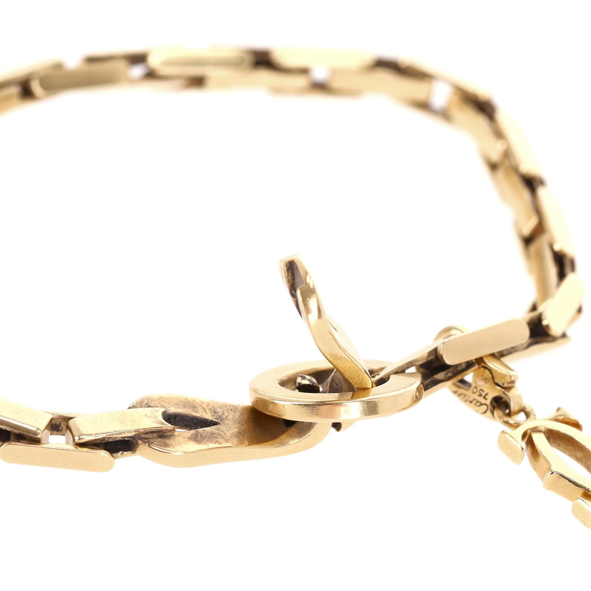 Cartier 18k Gold Agrafe Bracelet With Cartier Logo Charm For Sale 5