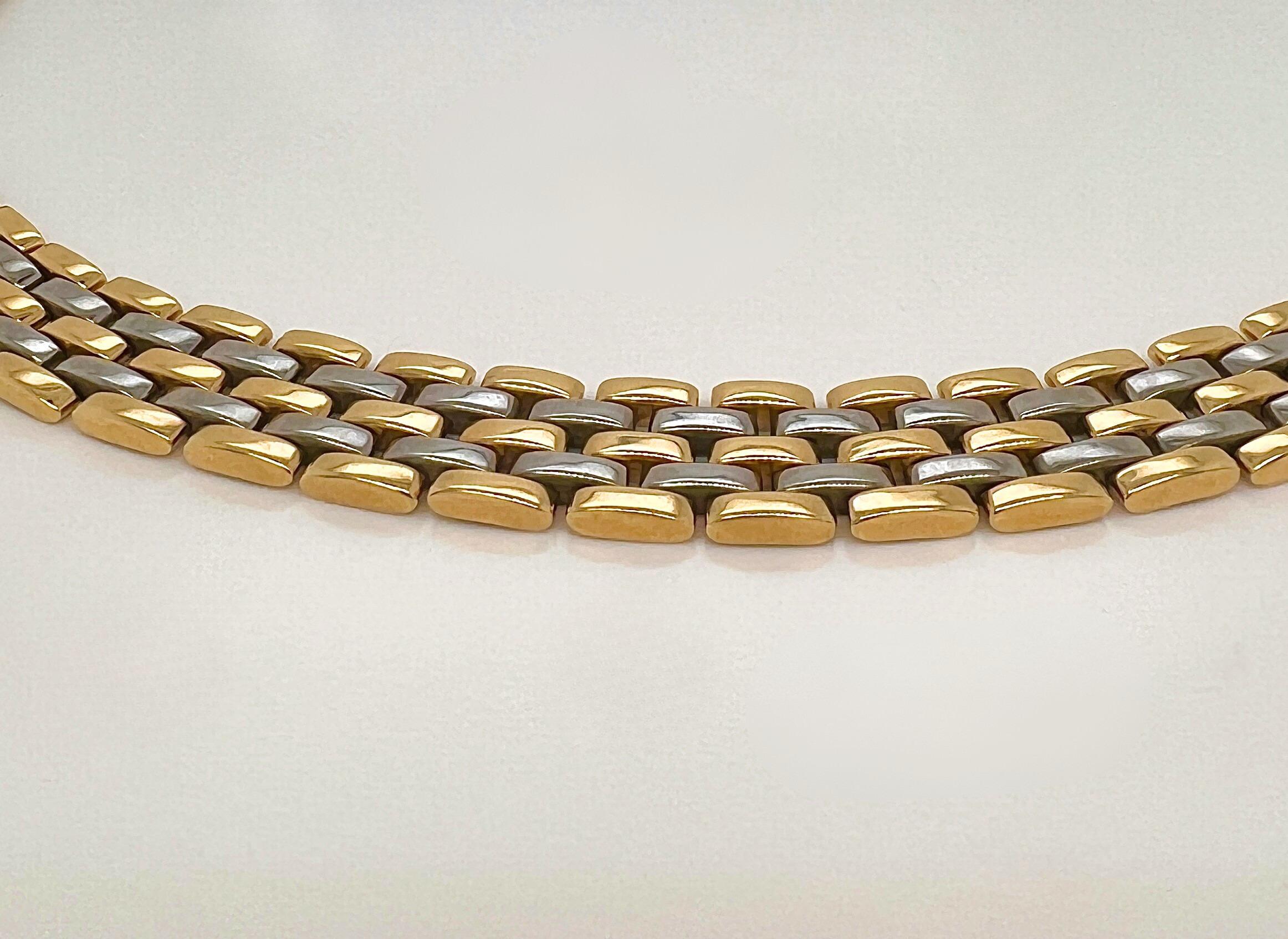 Cartier 18k Gold and Steel 5 Row Necklace

Measurements: 17.5
