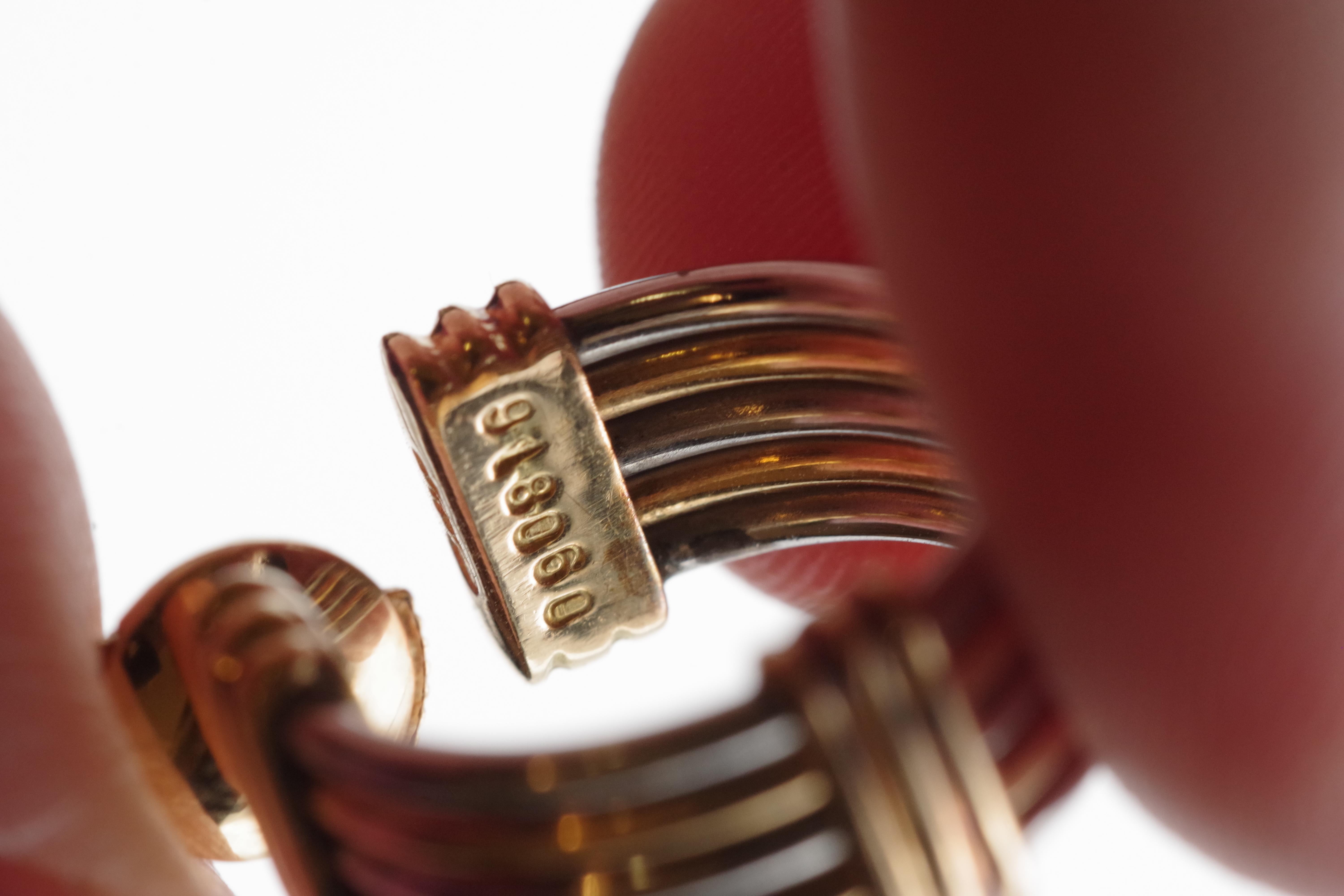 Boucles d'oreilles Cartier en or 18 carats et acier signées et numérotées des années 80. Pour femmes en vente