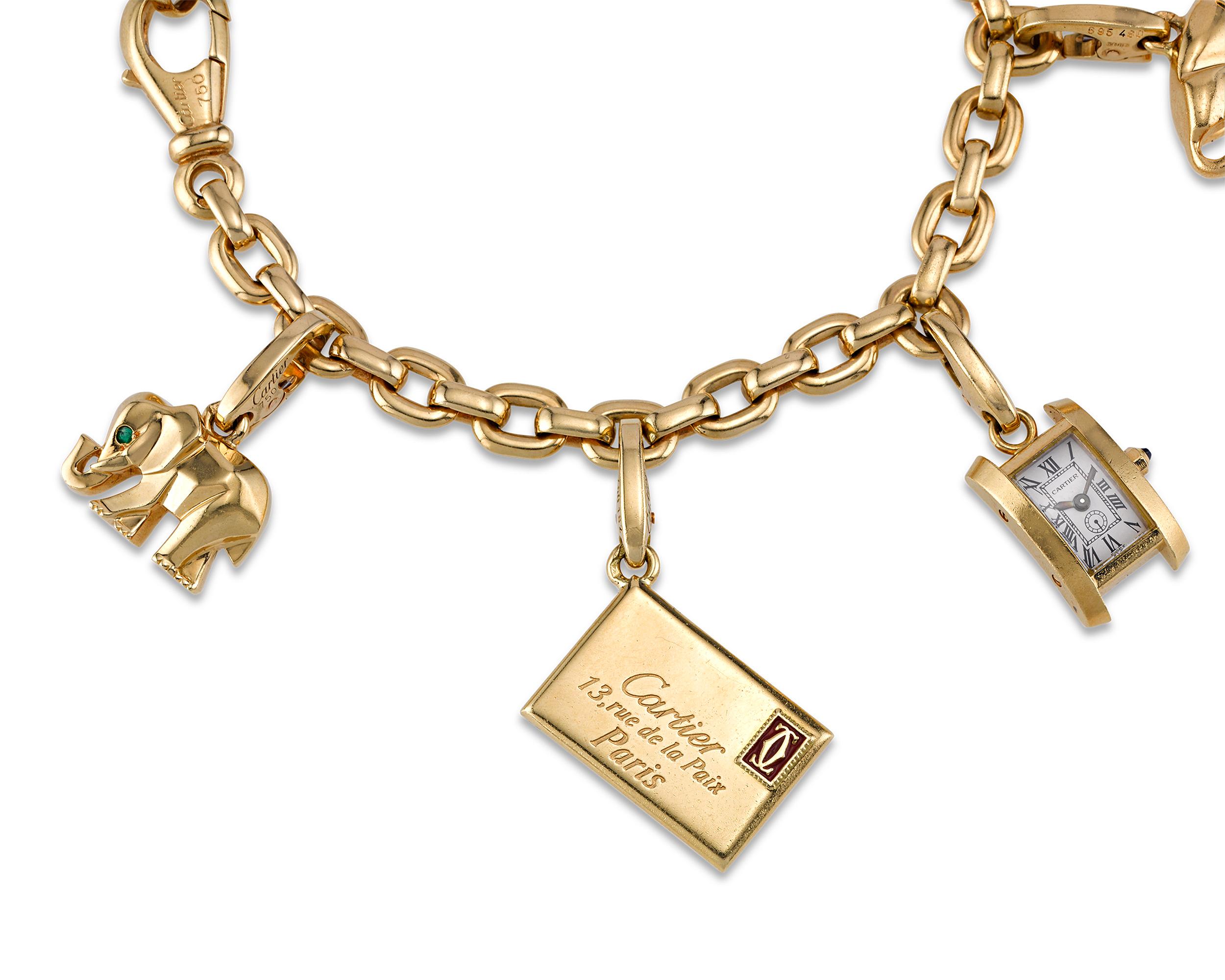 Some of the most iconic images associated with Cartier are featured in this vintage gold charm bracelet created by the legendary French jewelry house. The trace link chain design is perfect for amassing and displaying several charms. The charms