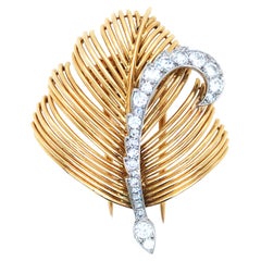Cartier, Broche en or 18 carats avec diamants