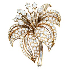 Cartier, Spilla a fiore con diamante in oro 18 carati