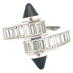 Cartier, 18K Gold Diamond Onyx 'Menotte' Crossover Ring