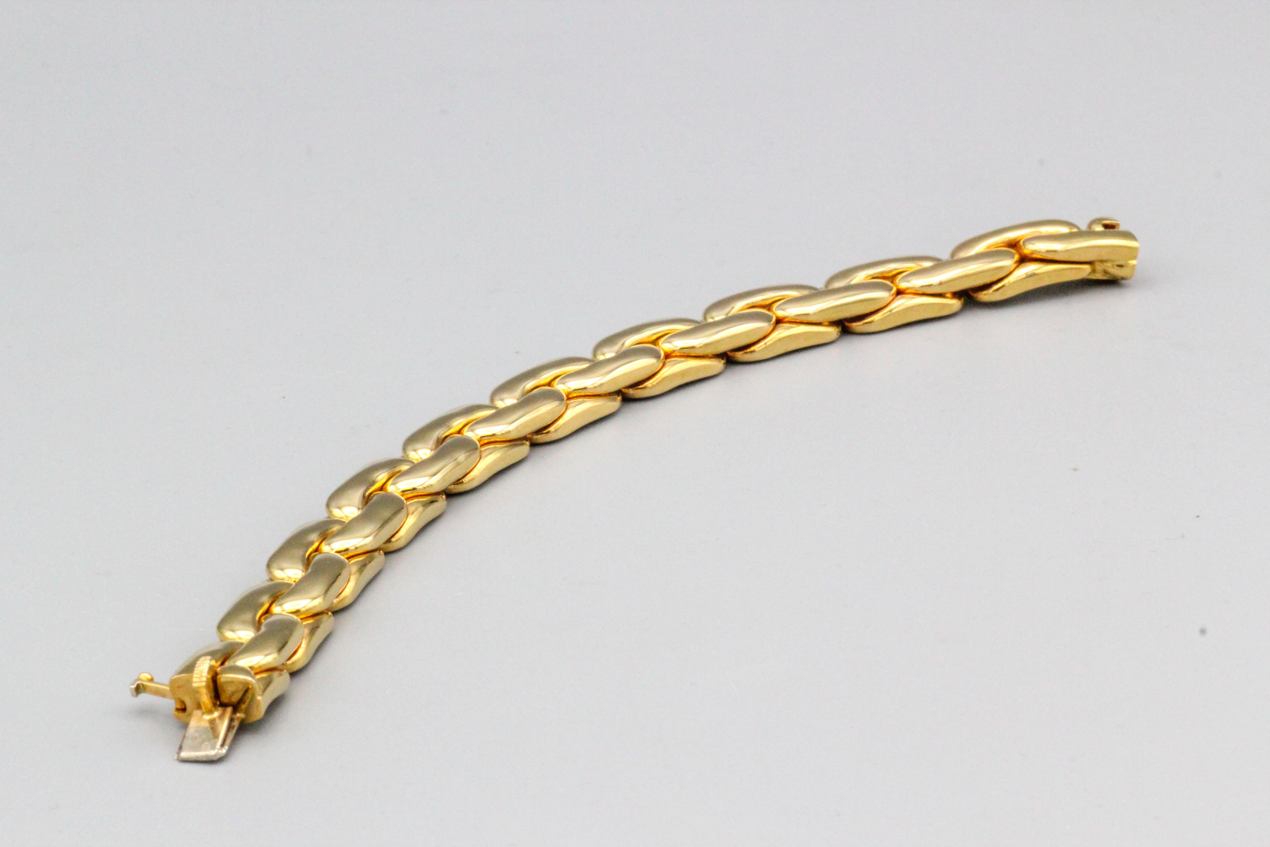 Contemporary Cartier 18k Gold Elongated Curb Link Bracelet For Sale