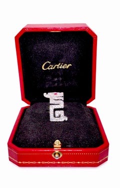 Spilla Cartier "Le Baiser du Dragon" in oro 18 carati con rubini e diamanti, CIRCA anni '90