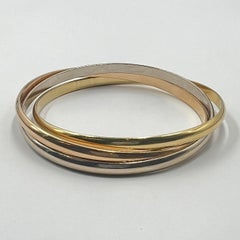 Cartier 18k Gold Trinity Rolling Bangle Bracelet