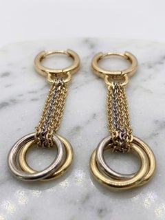 Pendientes largos de gota Cartier de oro multitono de 18 quilates