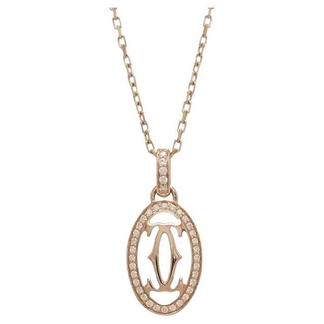 Cartier Pendentif double C en or rose 18 carats avec logo et diamants