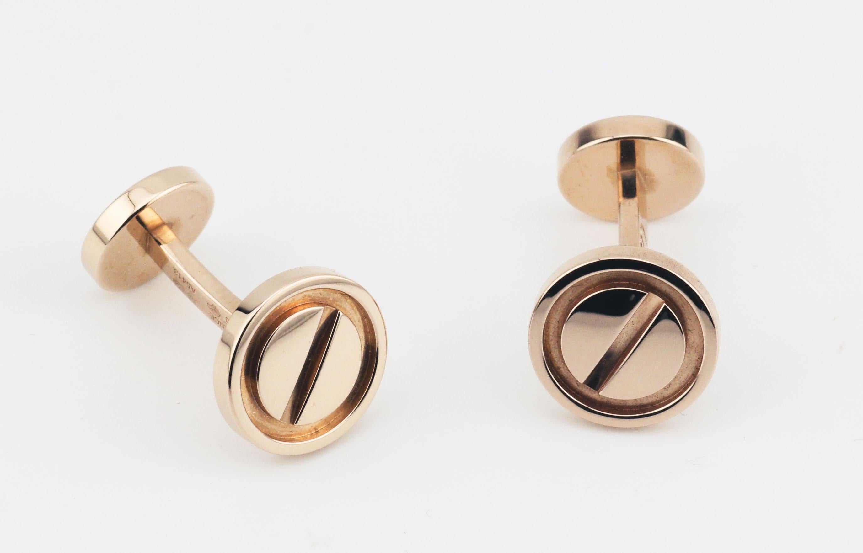 The Cartier 18K Pink Gold Love Dumbbell Cufflinks are a refined, luxurious take on Cartier’s iconic Love collection, celebrated for its timeless design and deep symbolism. Crafted from exquisite 18K pink gold, each cufflink features the distinctive