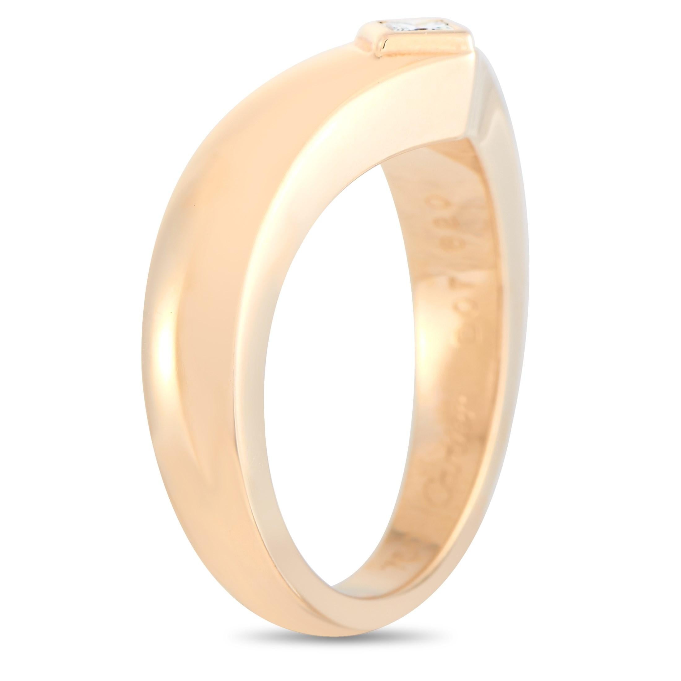 This Cartier 18K Rose Gold 0.10 ct Diamond Ring is a modern twist on the classic diamond ring. The band is made with beautiful 18K rose gold and set with a single 0.10 carat diamond. The band tapers into a V shape in the front where the diamond sits