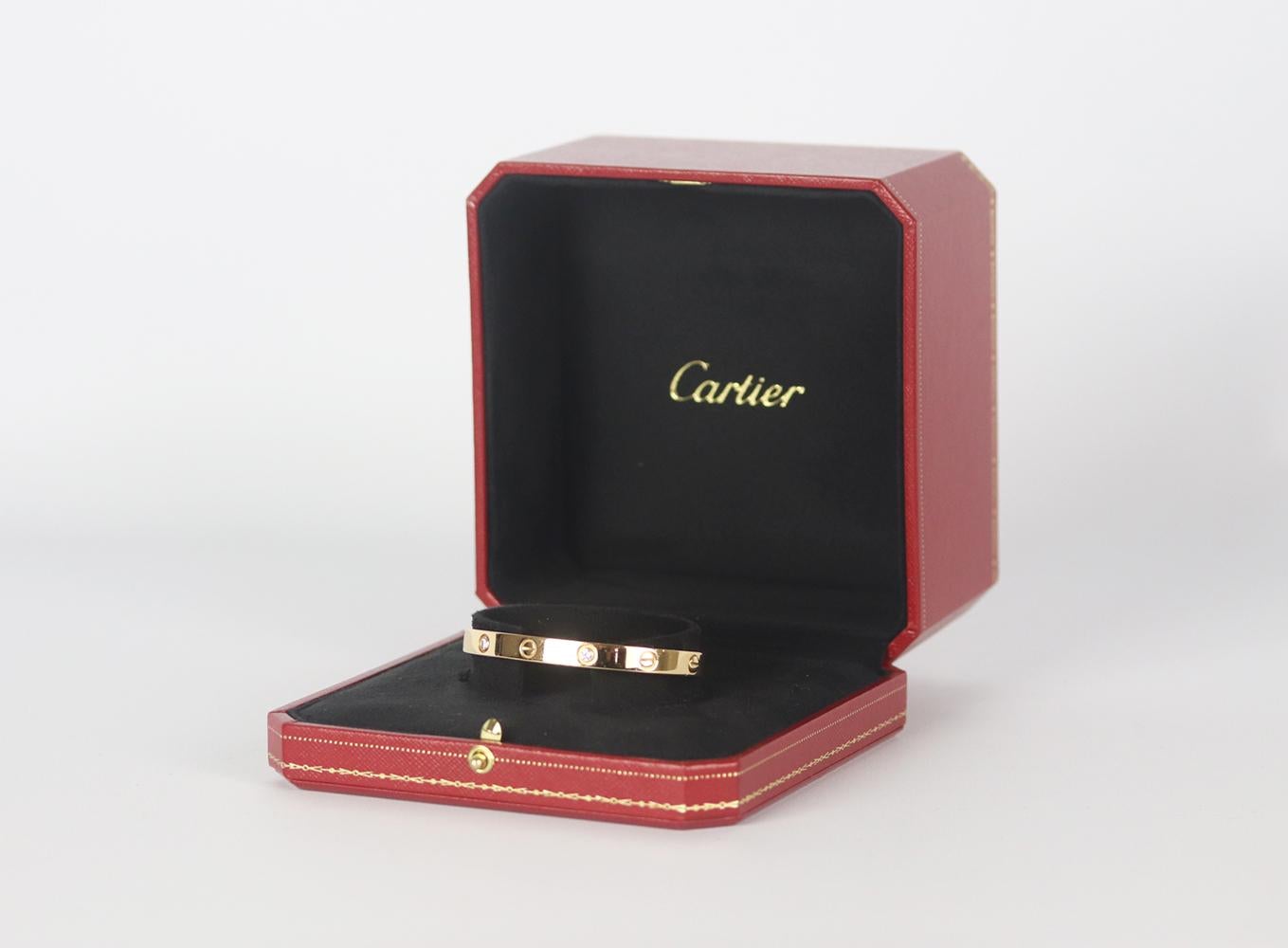 This Bracelet by Cartier is from their Love collection and features four round brilliant cut Diamonds made in 18k Rose Gold totalling 0.42 carats.
18K rose gold, four round diamonds.
Screw fastening at sides.
Comes with a screwdriver and