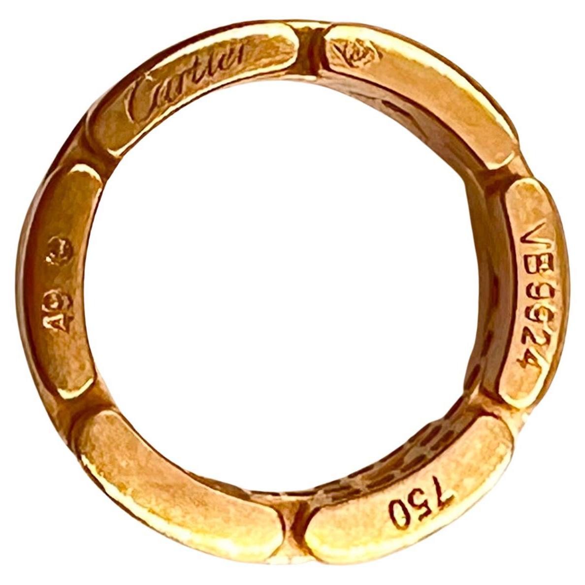 Cartier Maillon Panthere ring with round brilliant-cut diamonds set halfway around in polished 18k rose gold. 28 round brilliant-cut diamonds weighing approximately 0.41 total carats. Signed 'Cartier' '750' '49' with serial number.  Includes