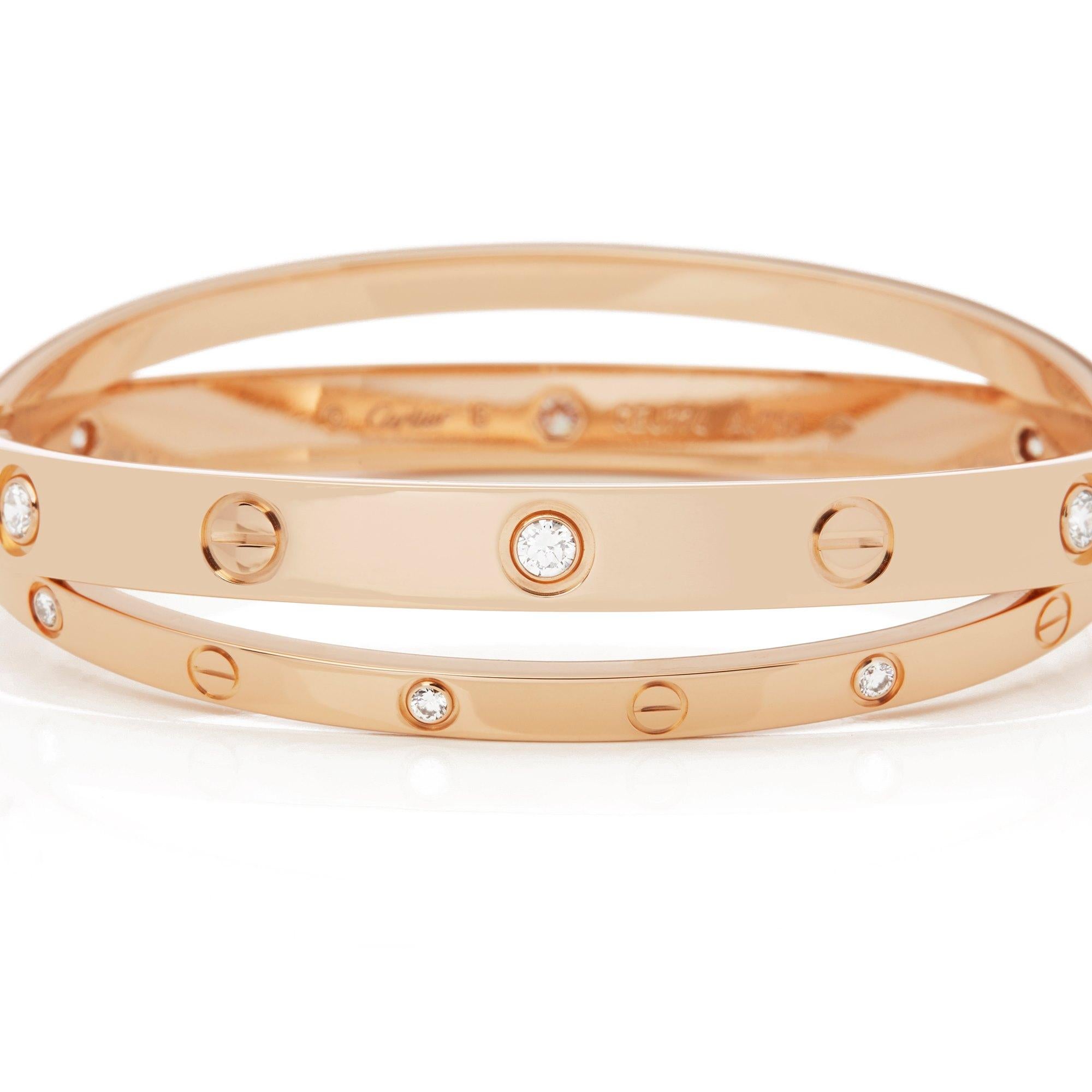 This Bangle by Cartier is from their Love collection and features Twelve Round Brilliant Cut Diamonds mounted in 18k Rose Gold. Size 16. Complete with Cartier Box and Original Warranty. Our Xupes reference is COMJ205 should you need to quote this.
