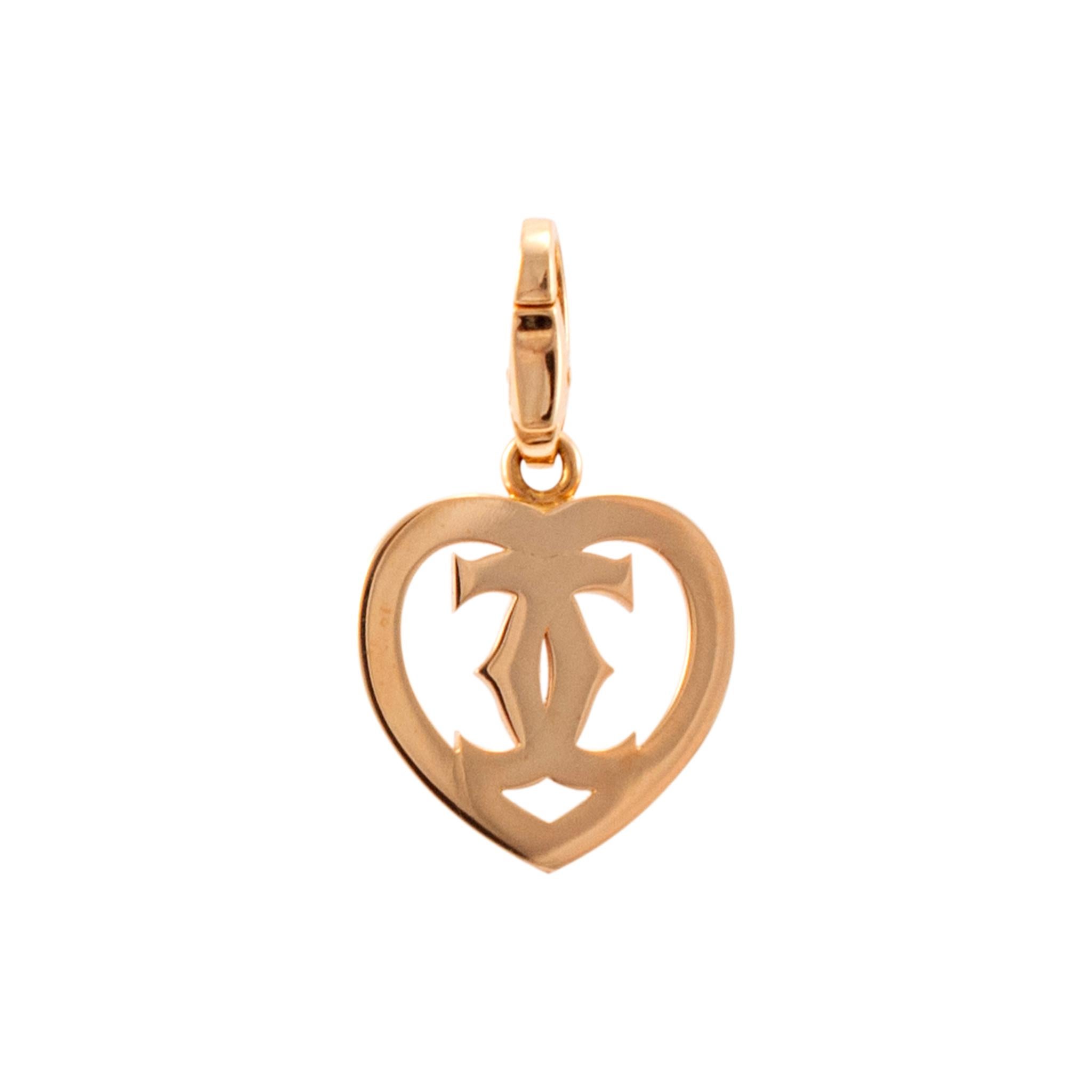 Brand: Cartier

Gender: Unisex

Metal Type: 18K Rose Gold

Length:  1.00 inches 

Width: 16.10 mm

Weight: 5.40 Grams

Designer made polished 18K rose gold, heart-shaped pendant. The metal was tested and determined to be 18K rose gold. Engraved with