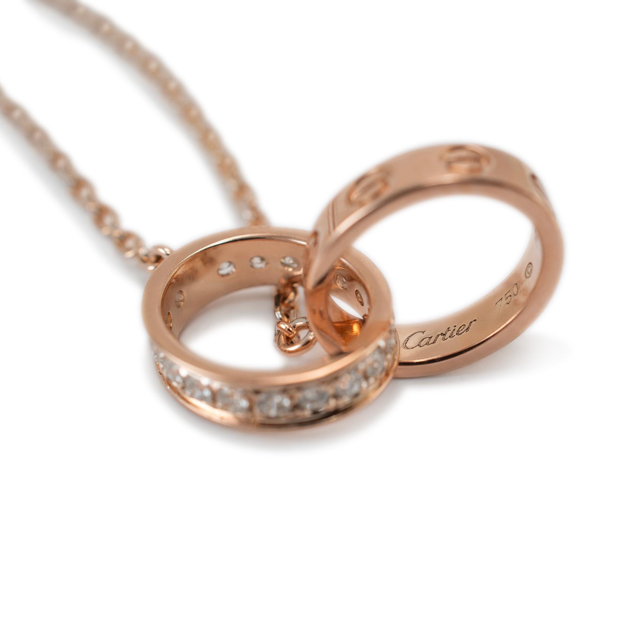 Cartier, collana con ciondolo Baby Love in oro rosa 18 carati e mezzo pavé di diamanti In condizioni ottime in vendita a Houston, TX