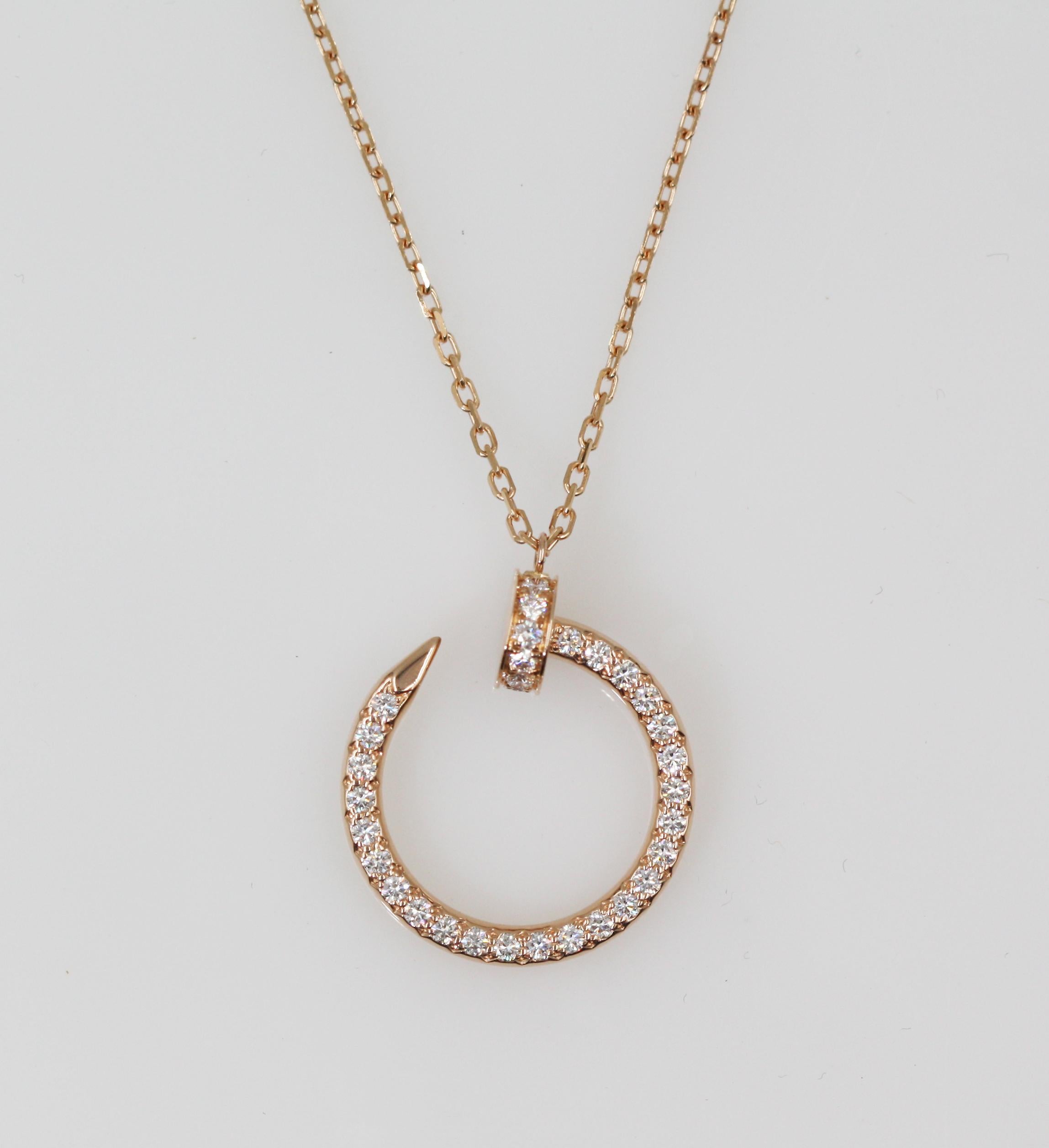 A stylish Cartier Juste Un Clou diamond pendant in 18k rose gold. The pendant is in the style of a nail and has pave diamonds set on one complete side of the nail. 
JUSTE UN CLOU Necklace, 0.25 carat of pave-set diamond are affixed in a 16