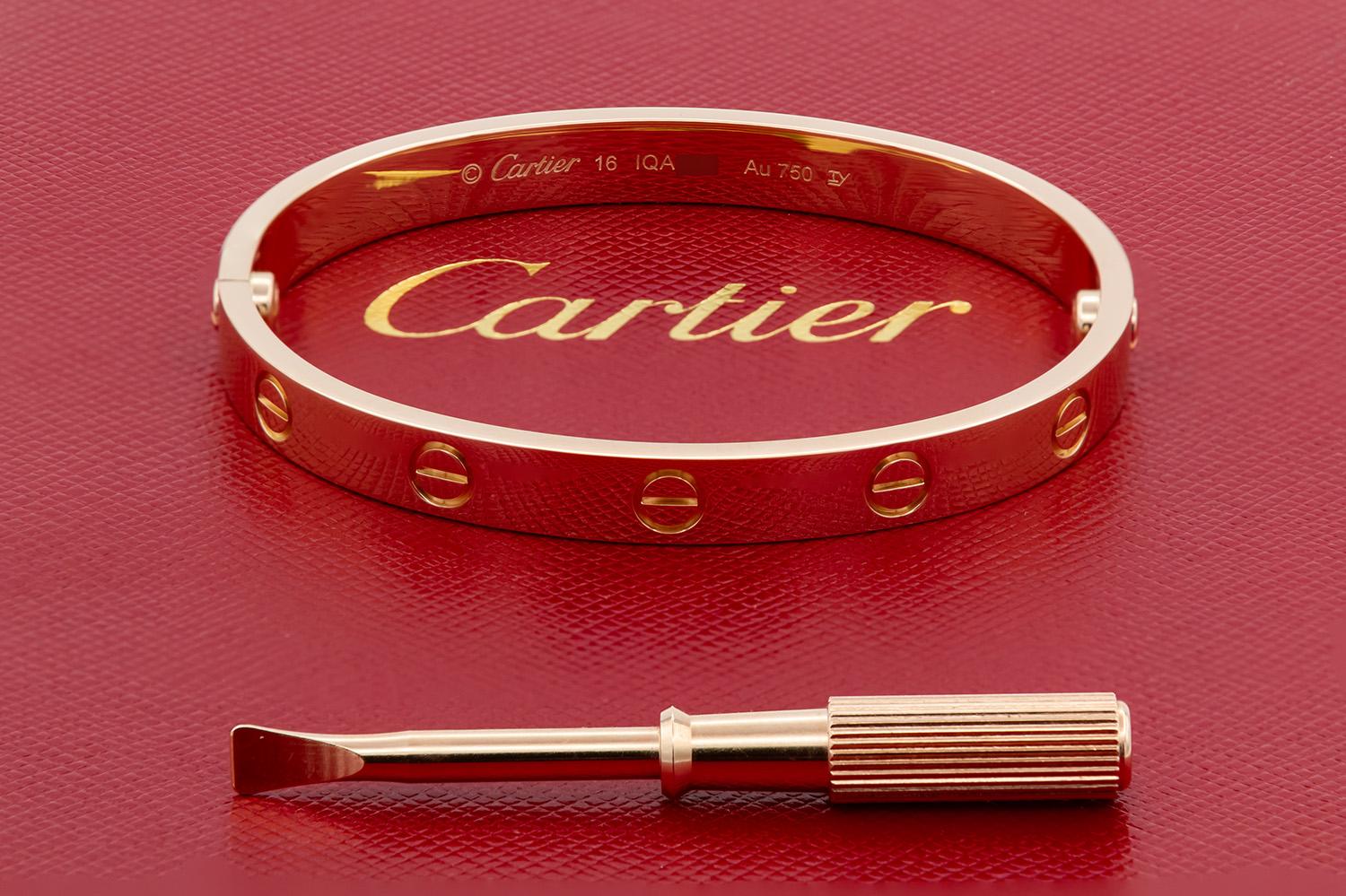 We are pleased to offer this Cartier 18K Rose Gold Love Bangle Bracelet Size 16. This bracelet was originally purchased from Cartier in August 2019 and it still in excellent condition! It features the new style screw system and comes complete with