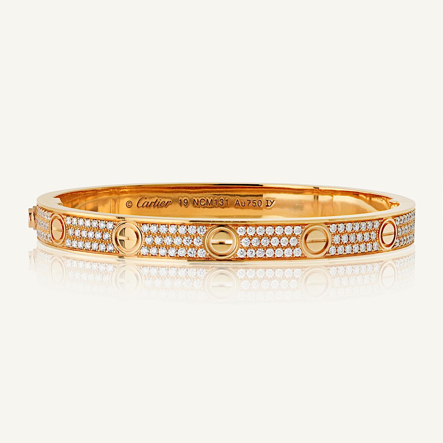 We are thrilled to offer a pre-owned Cartier Love Bracelet in luxurious 18K rose gold, set with brilliant round-cut pave diamonds. This iconic piece, known for symbolizing everlasting love and commitment, is in excellent condition, displaying its