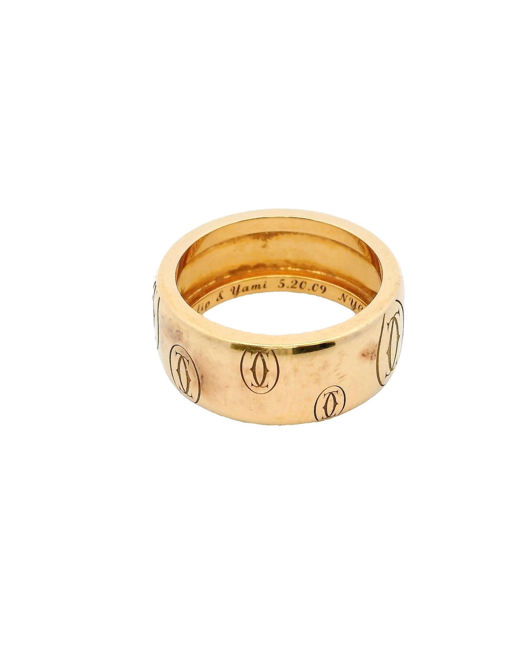This elegant ring is crafted in 18k rose gold. It features a repeating motif of interlocking ovals engraved around the band.

The ring is designed by Cartier, showcasing their signature style.

Total weight is 9.45 grams.

Ring size 5.5

C. 21st