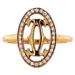 Cartier 18K Rose Gold Ring with Logo Double C Motif and Diamond Halo