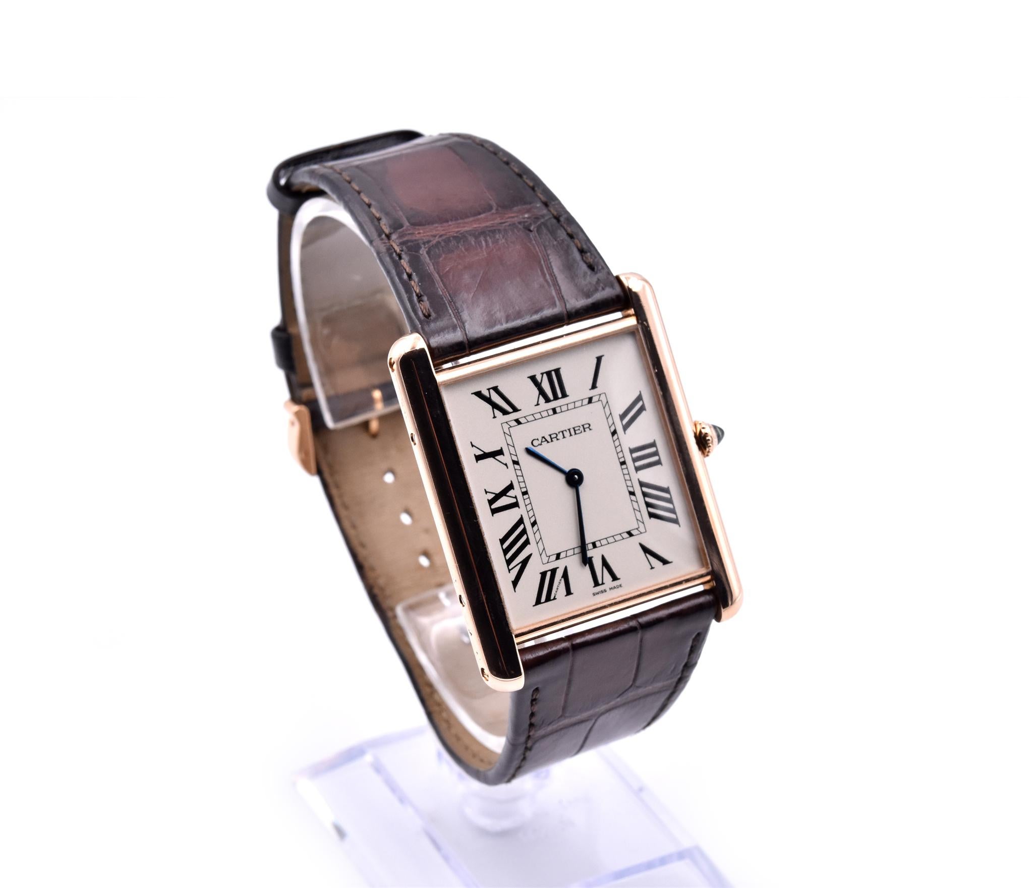 Movement: mechanical
Function: hours, minutes
Case: rectangle 32.30x40.40mm 18k rose gold case, sapphire protective crystal, pull/push crown with cabochon sapphire
Dial: silvered dial, blued-steel sword shaped hands, black Roman numerals
Band: