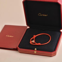 Cartier Bracelet en cordon de soie rouge Trinity 18 carats