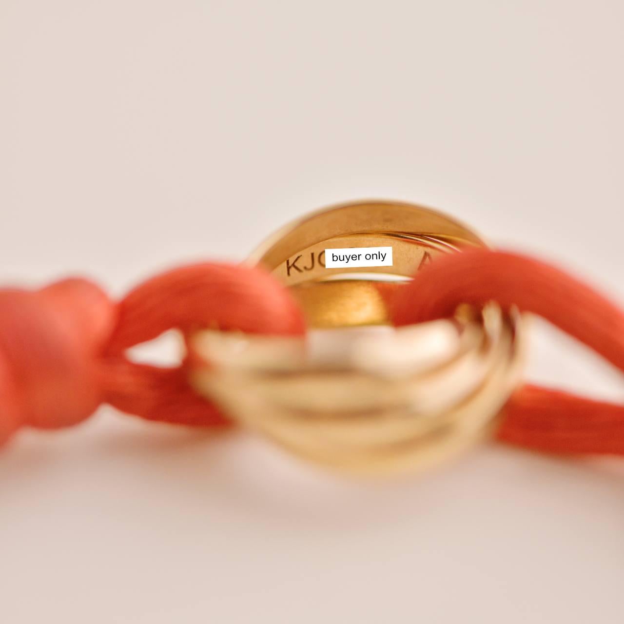 Women's or Men's Cartier 18K Rose Gold Trinity Red Silk Cord Bracelet