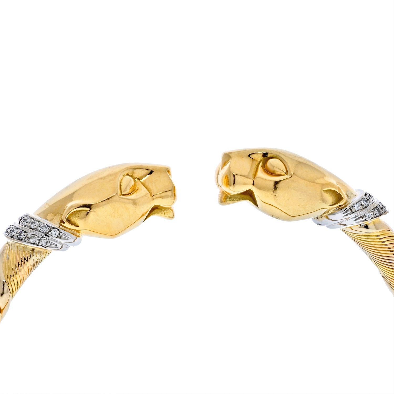 Seltenes Vintage-Armband Panthere De Cartier (Cougar) aus dreifarbigem 18-karätigem Gold in Spiralform. Dieses Armband hat zwei Pantherköpfe aus massivem Gelbgold an jedem Ende. Der Armreif ist ein 