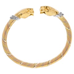 Cartier Bracelet panthère à double tête cougar 18 carats tricolore 1990