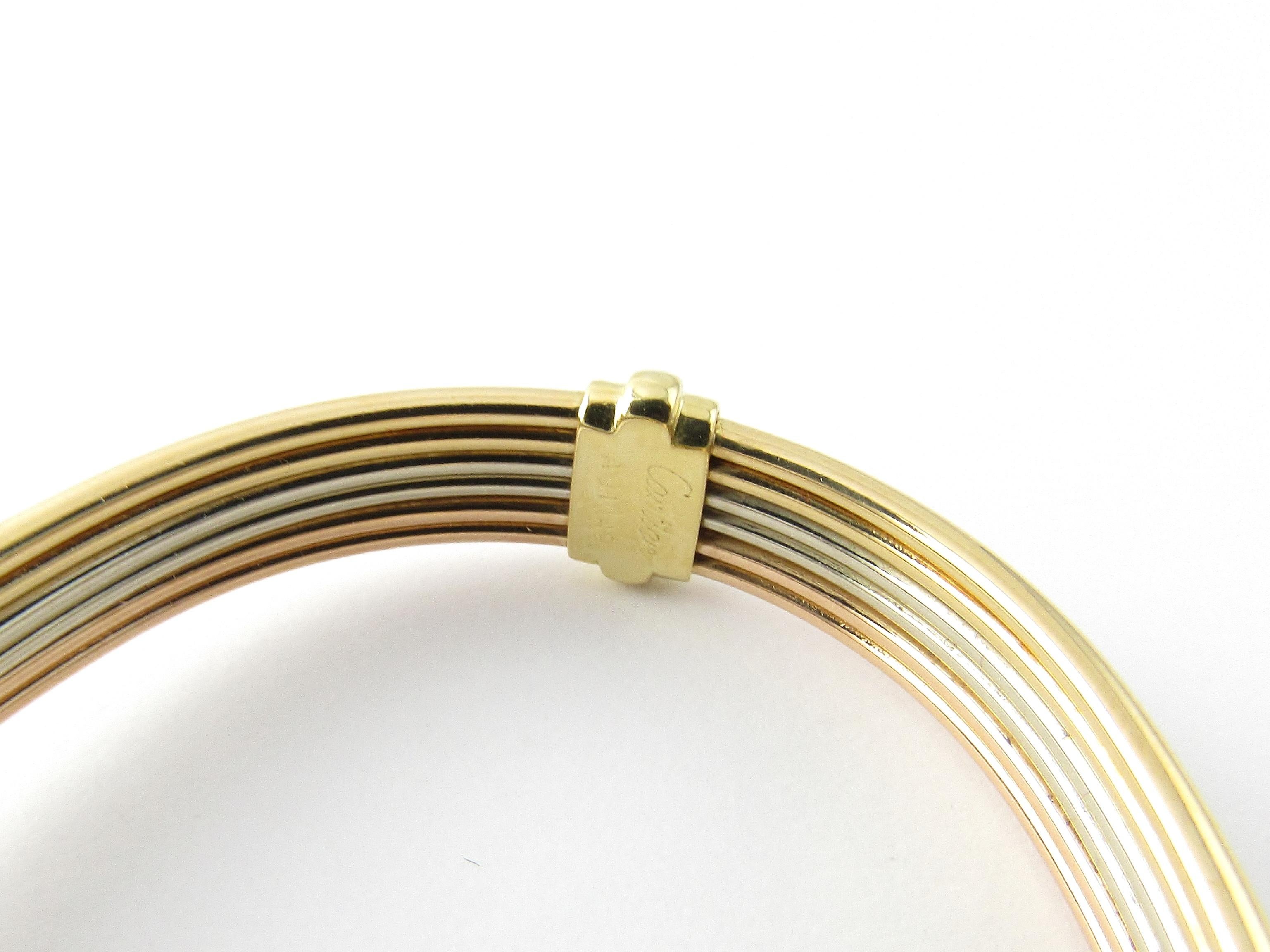 Cartier 18 Karat Tri-Color Gold Employee Anniversary Love Bracelet In Good Condition In Washington Depot, CT