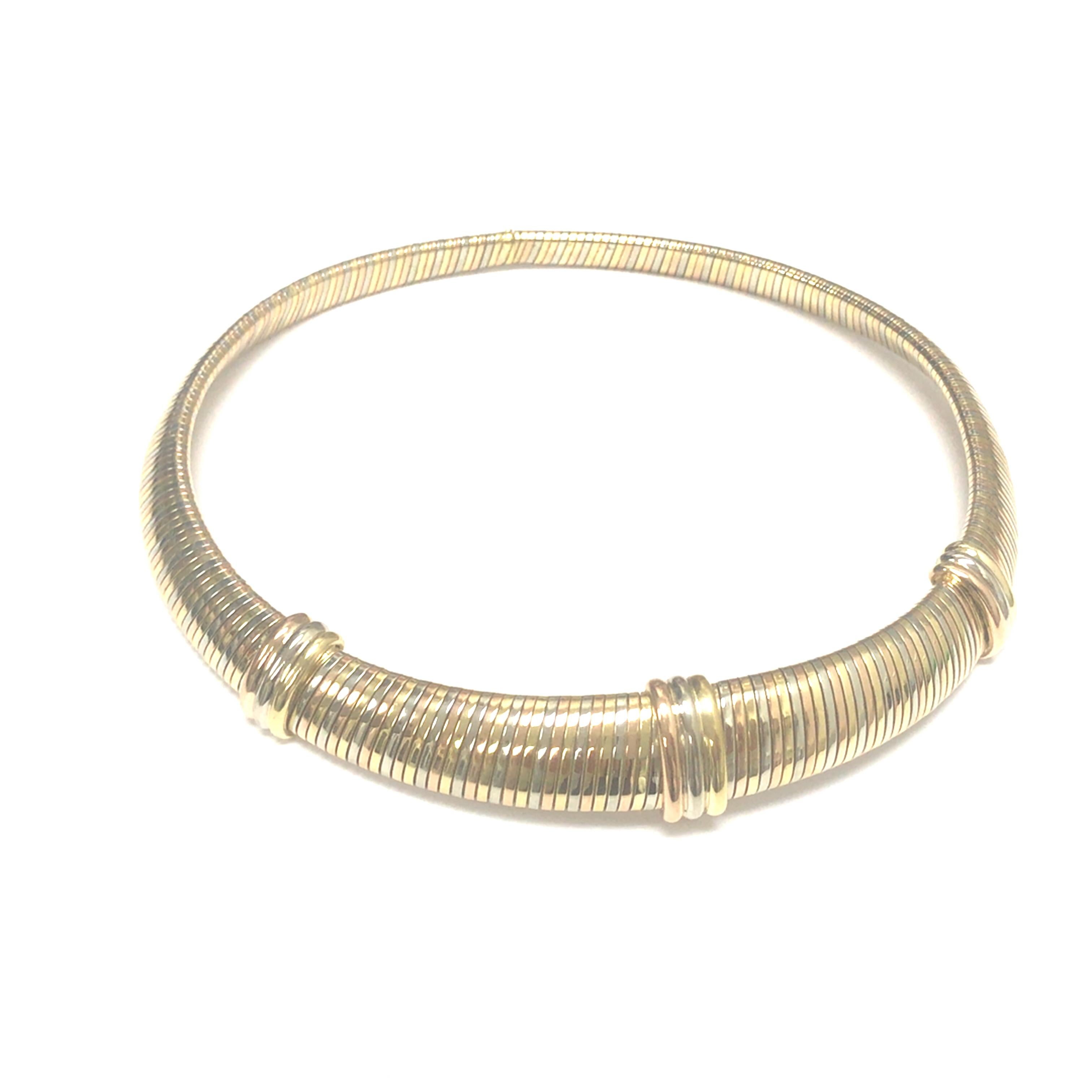 Cartier 18K Tri-Color Snake Choker Necklace.  The Necklace measures 16 inch in length and 5/8 inch in width.  98.59 grams.  Stamped Cartier 750 K18 1501. 98.59 Grams.