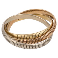 Cartier 18k tricolor oro acanalado trinidad rolling band