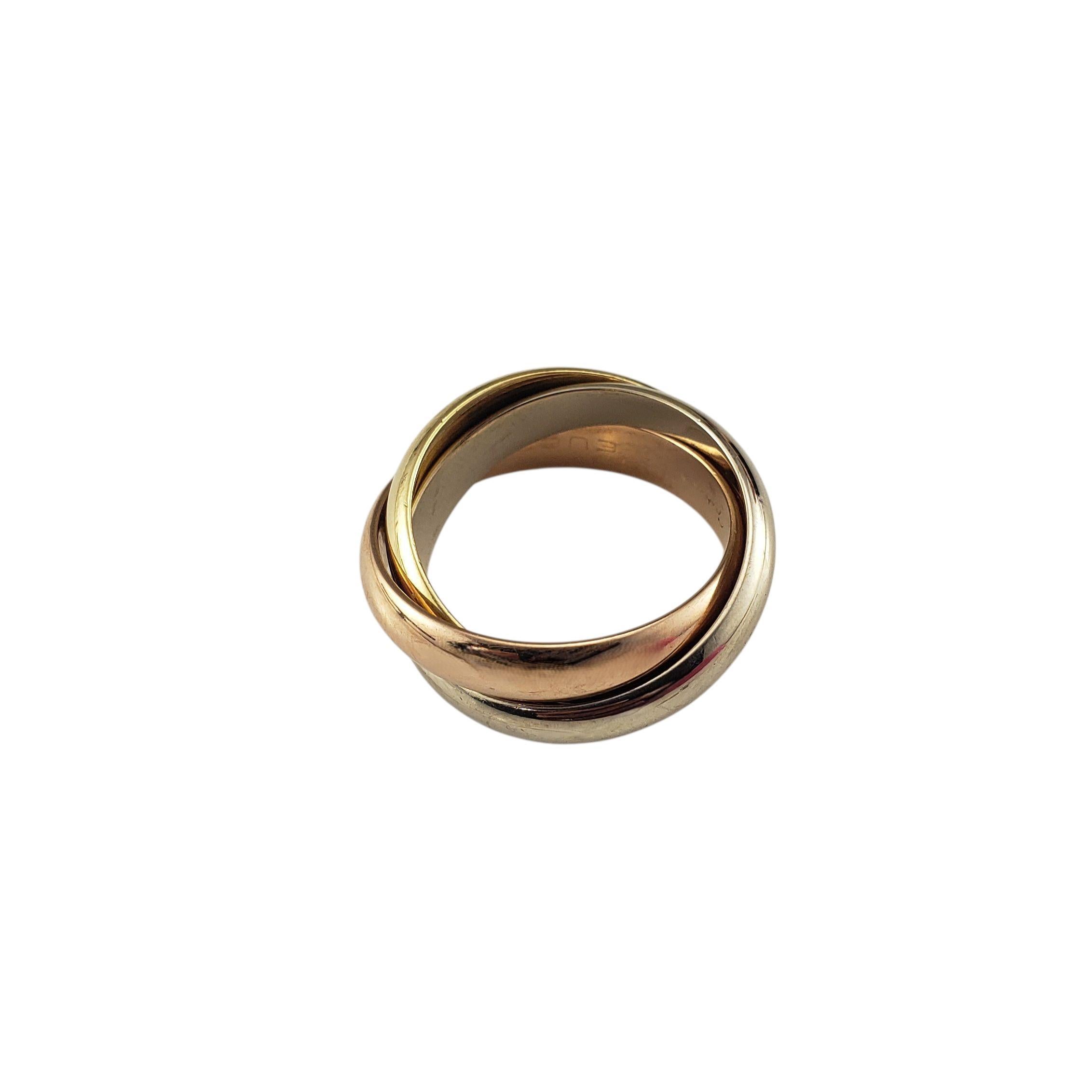 Cartier Anello Trinity Rolling Band in oro 18 carati tricolore misura 6,25

Un design iconico di Cartier con tre fasce intrecciate in oro giallo, bianco e rosa 18 carati. Questo classico anello rotante simboleggiava l'unità e l'eleganza senza tempo,