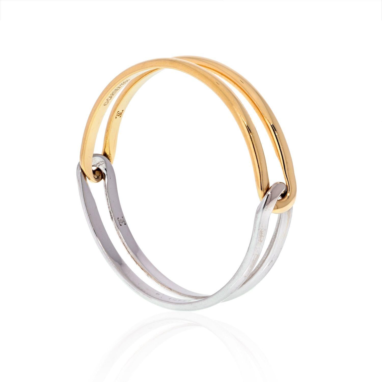 Cartier 18K Two Tone Interlocking Bangle Slip on Bracelet In Excellent Condition In New York, NY