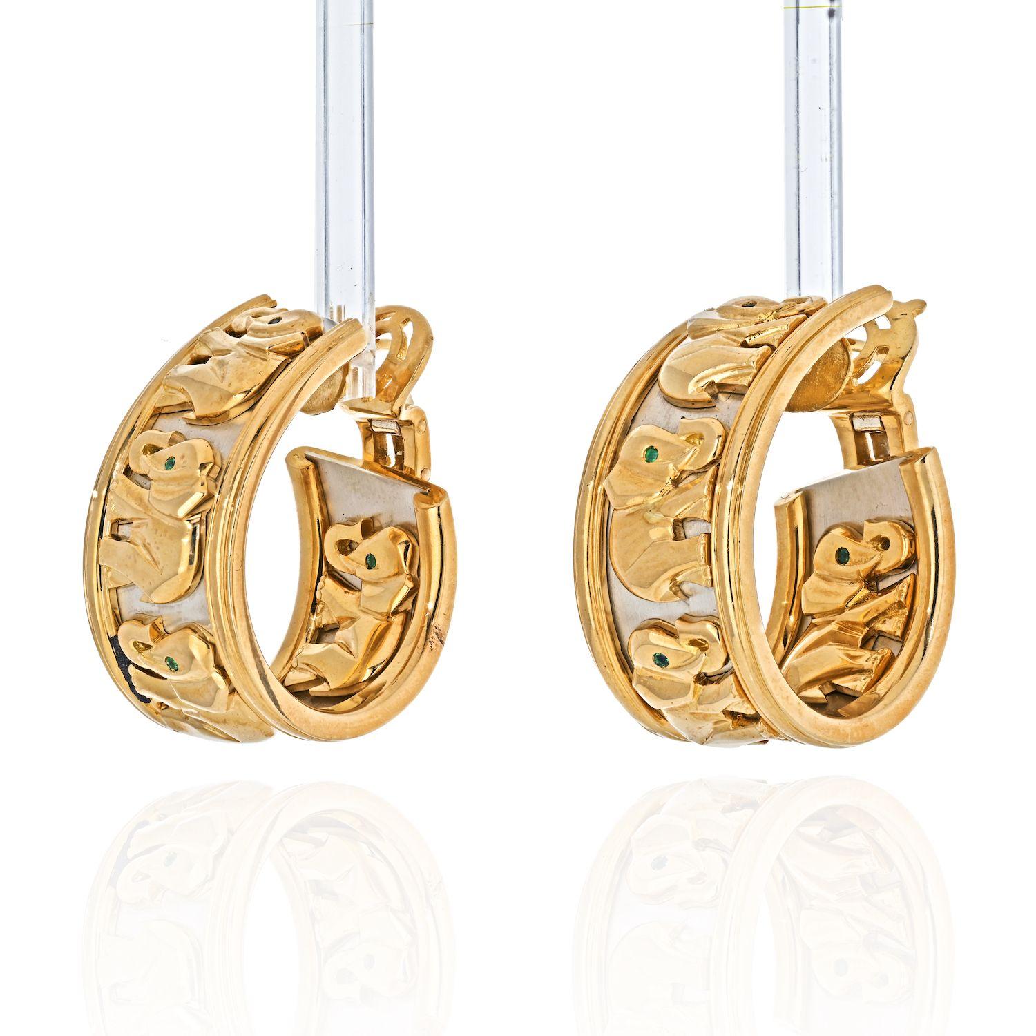 Gorgeous Vintage Cartier 18KT Yellow Gold Elephant Hoop Earrings Earrings weigh 47 grams.
Earrings contain green emeralds set as eyes. 
Earrings contain no posts, but we can have some put on. 
Earrings are 1 1/4 inches in length and in between 1/2